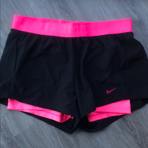 Nike Pants - Nike black shorts with pink built in spandex